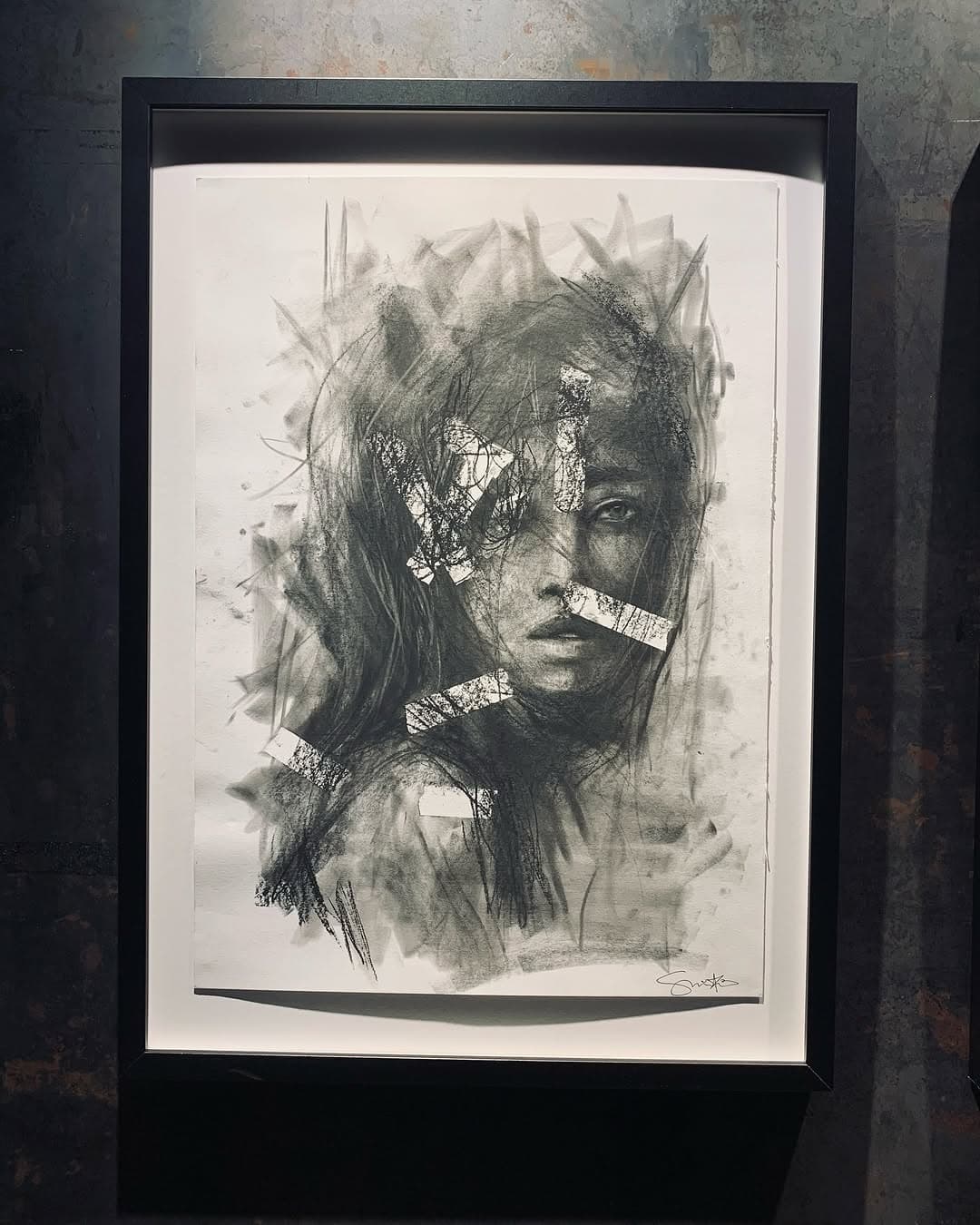 Layered charcoal piece with controlled distortion